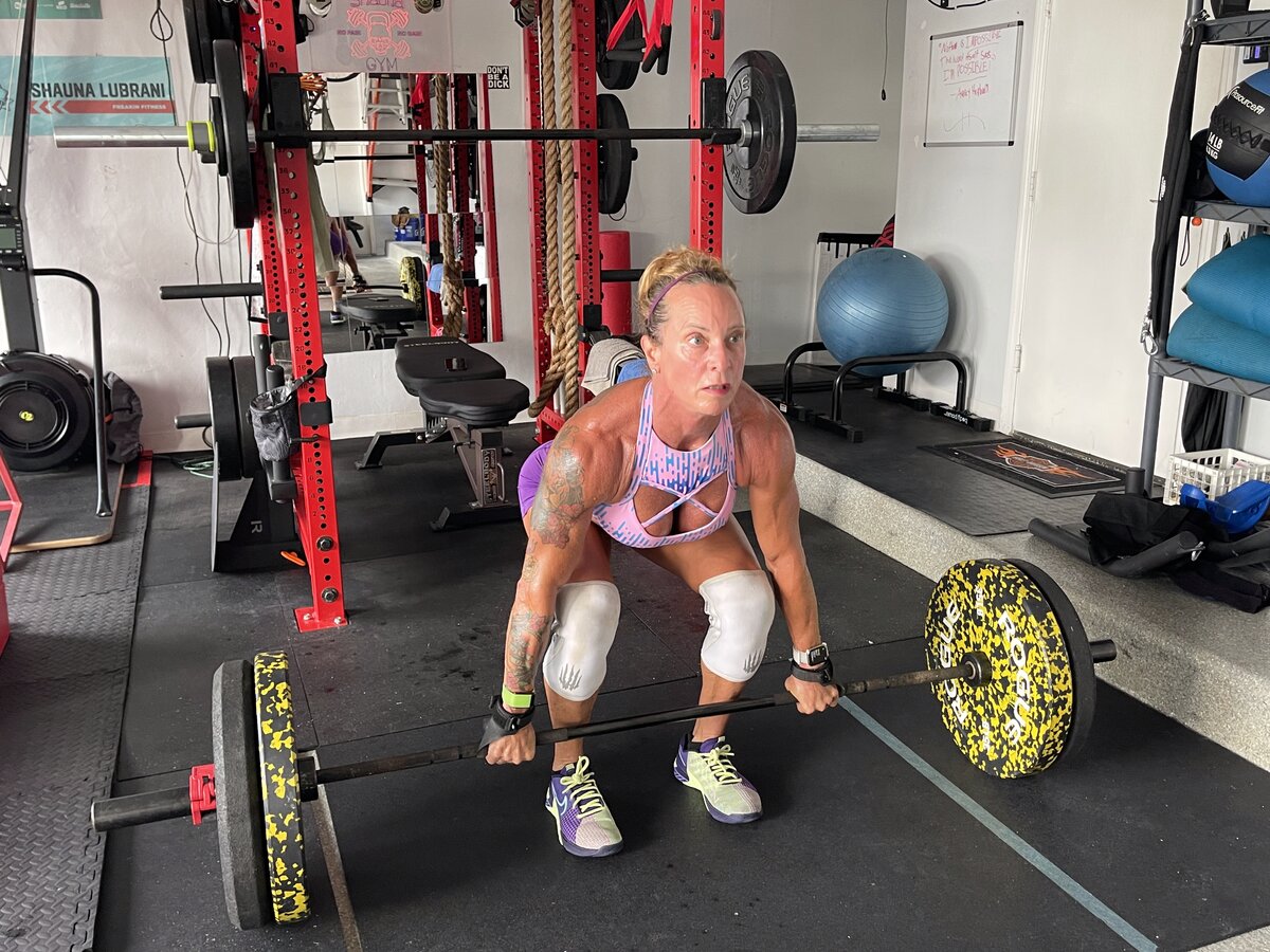 Shauna Lubrani barbell exercise garage gym